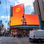 GTA 6 Spotify billboards featuring Travis Scott and Keith Richards artwork in New York and Miami