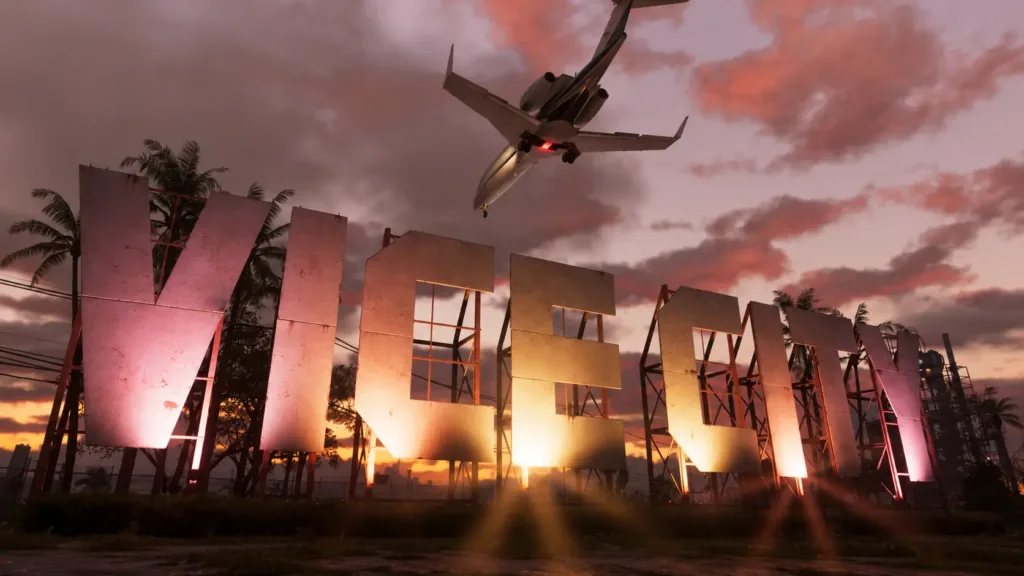 GTA 6 Vice City marketing sign illuminated at sunset with an aircraft overhead